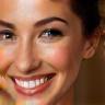 Olivia M., spa client, smiling